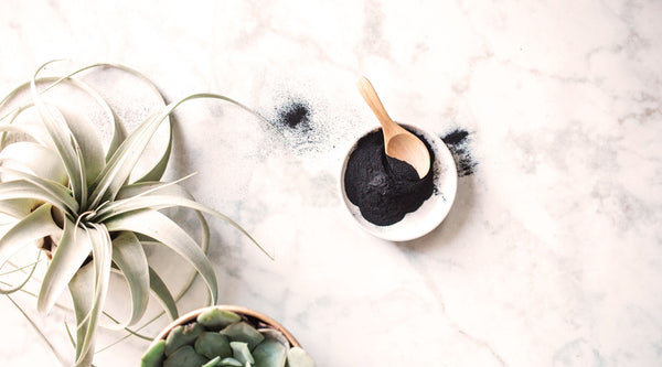 Shrink your pores with Activated Charcoal! Learn more about the amazing benefits of Activated Charcoal for your skin on the SpaGoddess Blog.