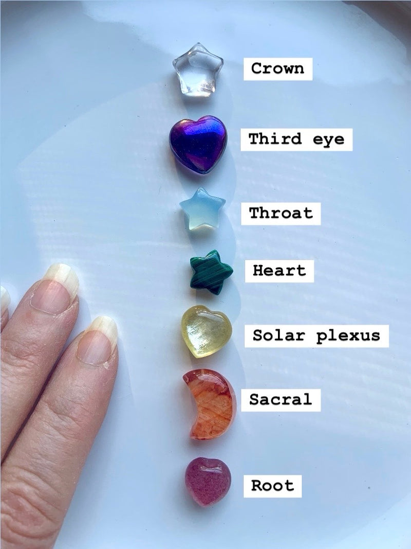 Align the Rainbow Crystal gems with your chakra column and work with them to clear and balance your chakras.