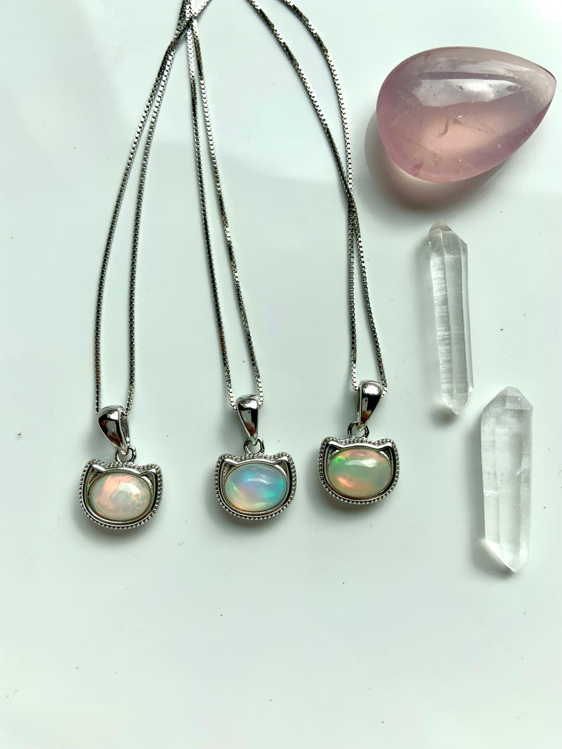 Ethiopian Fire Opal Cat Necklace with Sterling Silver setting + adjustable chain. Makes the perfect gift for your favorite cat lover. You choose your favorite!