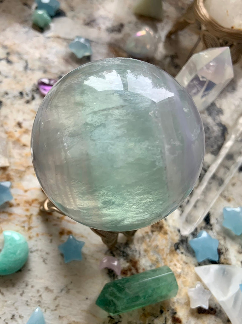 Luminous Yttrium Fluorite Sphere with Scolecite Inclusions # 3