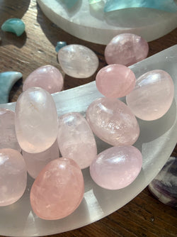 High quality rose quartz tumbled stones with lots of sparkle and pretty a translucent pink color